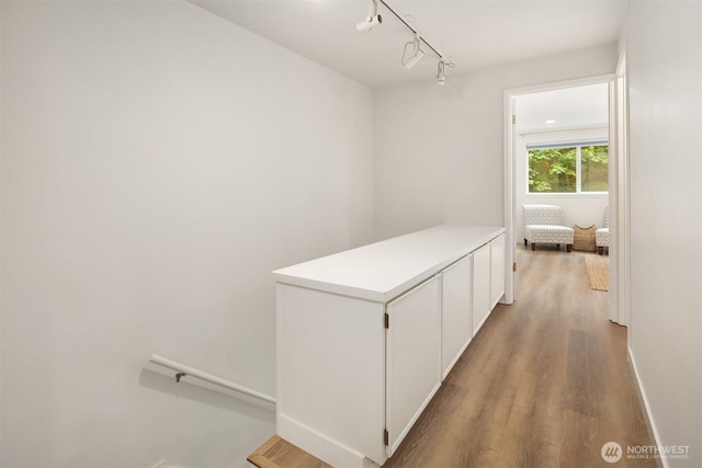 16932 NE 2nd Pl, Bellevue, WA 98008 - corridor with wood finished floors and track lighting