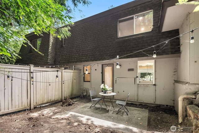 16932 NE 2nd Pl, Bellevue, WA 98008 - rear view of property featuring a patio and roof with shingles