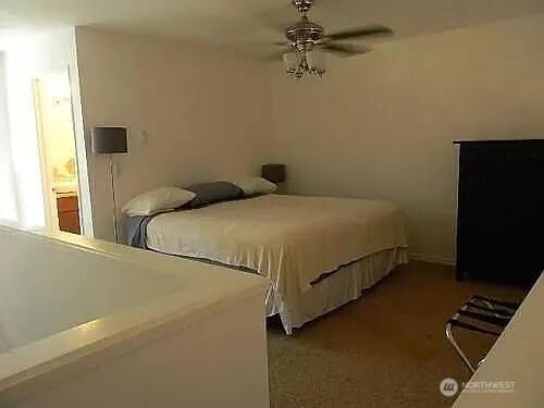1750 NW 58th St, Seattle, WA 09107 - carpeted bedroom with a ceiling fan