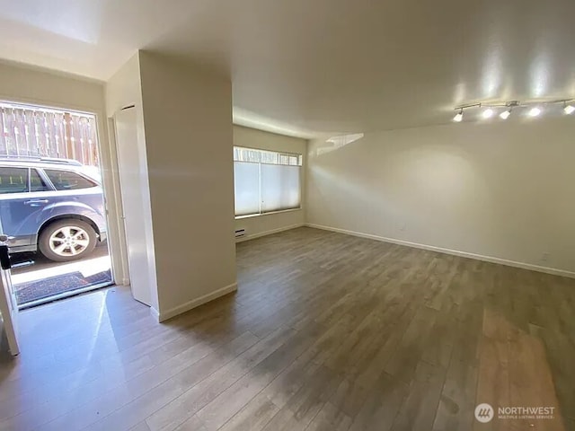 1750 NW 58th St, Seattle, WA 09107 - spare room with wood finished floors and baseboards