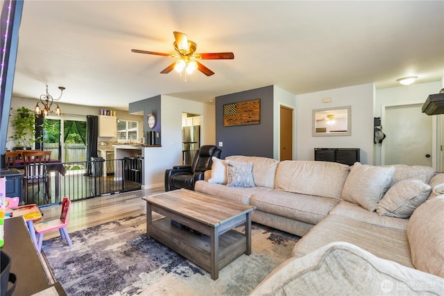 1390 Jordan Ct, Oak Harbor, WA 98277 - living area with wood finished floors and ceiling fan
