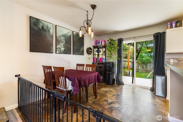 1390 Jordan Ct, Oak Harbor, WA 98277 - dining area with a chandelier and stone finish flooring