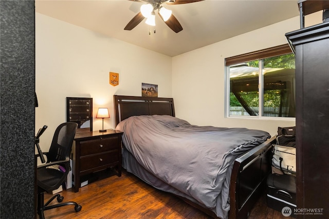 1390 Jordan Ct, Oak Harbor, WA 98277 - bedroom with dark wood-style flooring and a ceiling fan