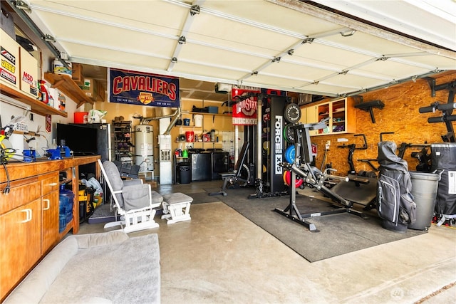 1390 Jordan Ct, Oak Harbor, WA 98277 - garage with a workshop area and secured water heater