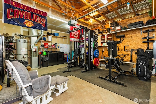 1390 Jordan Ct, Oak Harbor, WA 98277 - workout area featuring secured water heater, washing machine and dryer, and a workshop area