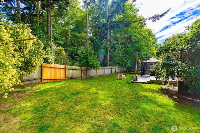 1390 Jordan Ct, Oak Harbor, WA 98277 - fenced backyard with a gazebo and a wooden deck