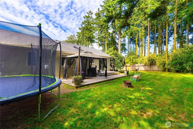 1390 Jordan Ct, Oak Harbor, WA 98277 - view of yard featuring a trampoline and a gazebo