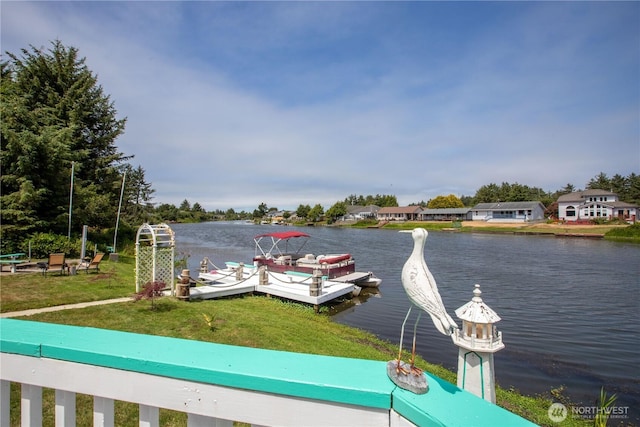 118 Ocean Lake Way NE, Ocean Shores, WA 98569 - dock with a water view and a yard