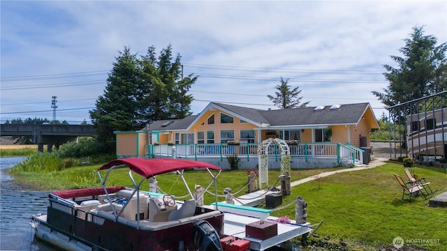 118 Ocean Lake Way NE, Ocean Shores, WA 98569 - back of house featuring a yard