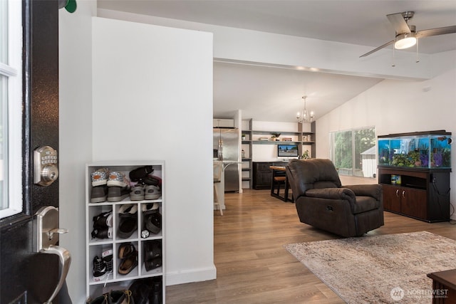 207 6th St, Sultan, WA 98294 - living area featuring a chandelier, a ceiling fan, and wood finished floors