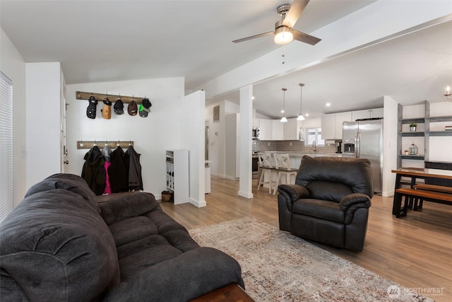 207 6th St, Sultan, WA 98294 - living area with vaulted ceiling, light wood-type flooring, and ceiling fan