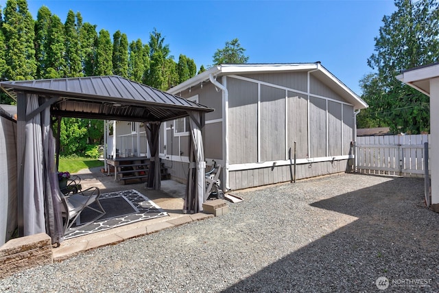 207 6th St, Sultan, WA 98294 - exterior space with a gazebo, a patio, and a metal roof