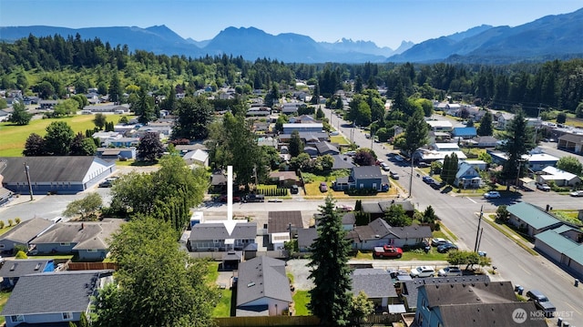 207 6th St, Sultan, WA 98294 - aerial view of residential area with mountains
