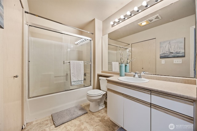 11130 SE 208th St Unit N101, Kent, WA 98031 - bathroom featuring vanity and bath / shower combo with glass door