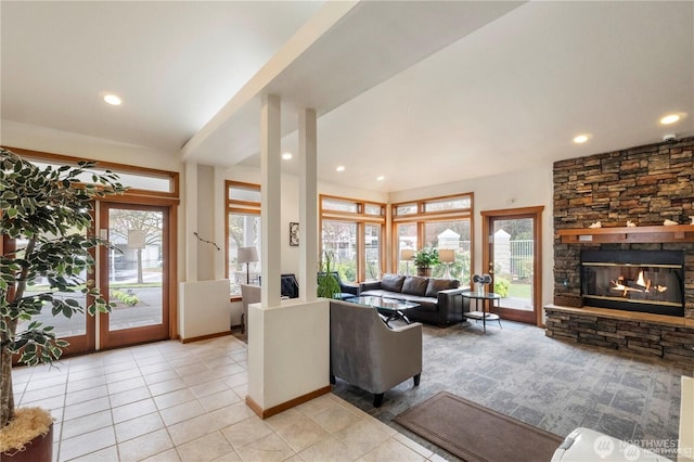 11130 SE 208th St Unit N101, Kent, WA 98031 - living area featuring light tile patterned flooring, a stone fireplace, and recessed lighting