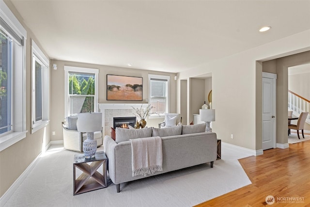 2648 116th Ave NE, Bellevue, WA 98004 - living room featuring a fireplace, light wood-style flooring, and recessed lighting