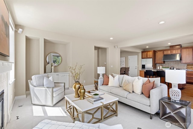 2648 116th Ave NE, Bellevue, WA 98004 - living room with recessed lighting and a glass covered fireplace