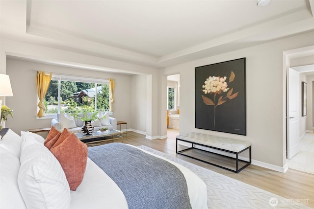2648 116th Ave NE, Bellevue, WA 98004 - living room with a tray ceiling and light wood-type flooring