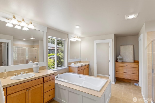 2648 116th Ave NE, Bellevue, WA 98004 - bathroom featuring a stall shower, two vanities, a garden tub, tile patterned floors, and recessed lighting