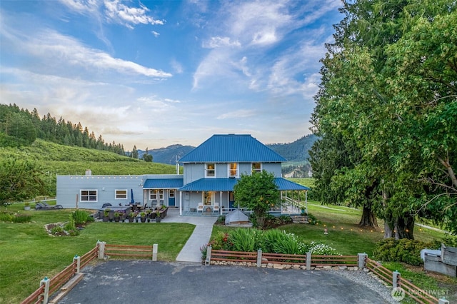 9753 Nibbelink Rd, Peshastin, WA 98847 - back of house featuring a metal roof and a mountain view
