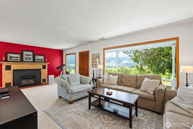 9753 Nibbelink Rd, Peshastin, WA 98847 - carpeted living area with a brick fireplace