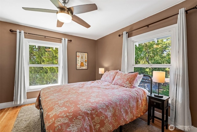 9753 Nibbelink Rd, Peshastin, WA 98847 - bedroom featuring multiple windows, wood finished floors, and ceiling fan