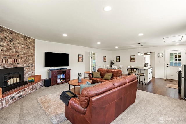 9753 Nibbelink Rd, Peshastin, WA 98847 - living room featuring plenty of natural light, recessed lighting, a fireplace, and dark carpet