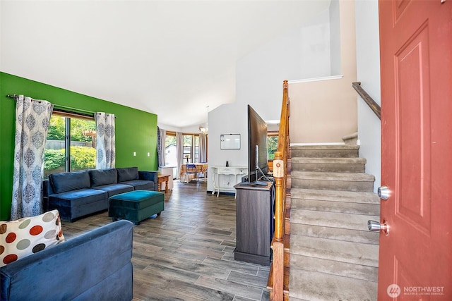 9304 Farwest Dr SW, Tacoma, WA 98498 - living area with wood finished floors, lofted ceiling, and stairway