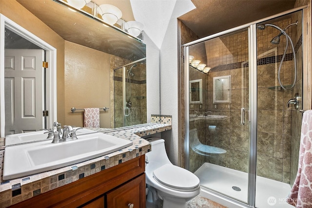 9304 Farwest Dr SW, Tacoma, WA 98498 - bathroom with a textured wall, vanity, and a shower stall