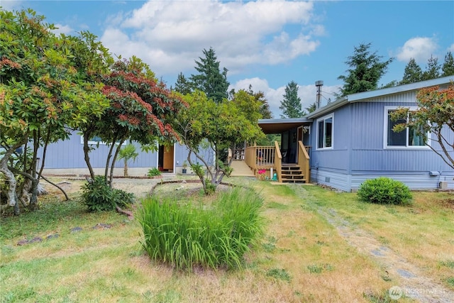 1402 301st Pl, Ocean Park, WA 98640 - view of grassy yard featuring a porch
