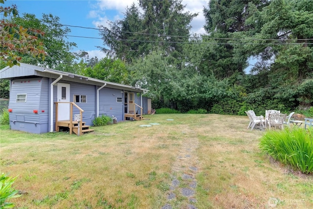1402 301st Pl, Ocean Park, WA 98640 - view of grassy yard featuring entry steps
