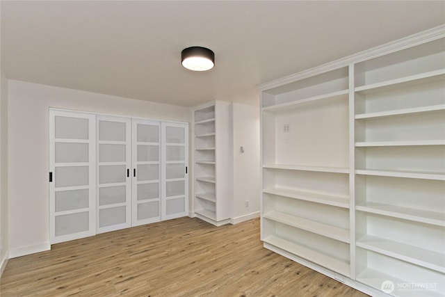 11811 93rd Ln NE Unit 102, Kirkland, WA 98034 - spacious closet with wood finished floors
