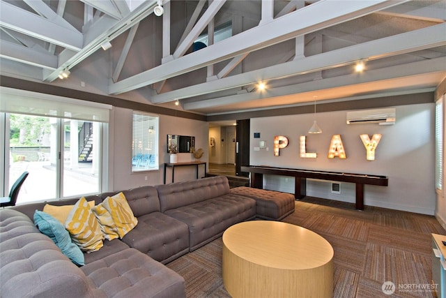 11811 93rd Ln NE Unit 102, Kirkland, WA 98034 - carpeted living room featuring an AC wall unit, beam ceiling, and high vaulted ceiling