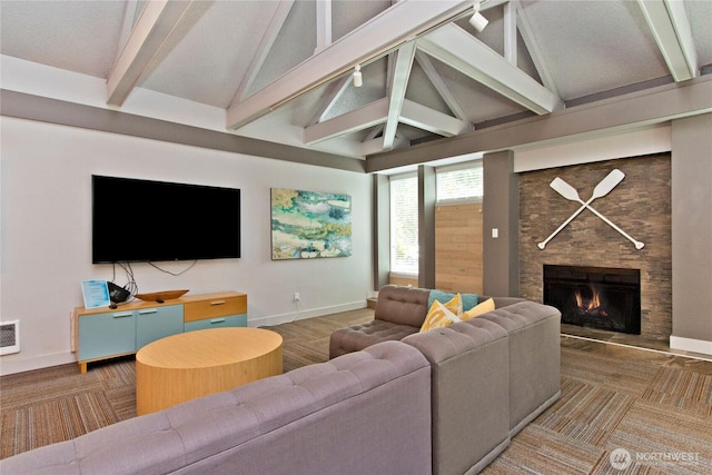 11811 93rd Ln NE Unit 102, Kirkland, WA 98034 - living room with beamed ceiling, a large fireplace, and high vaulted ceiling