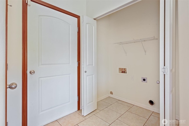 8305 54th Ct SE, Lacey, WA 98513 - laundry area with electric dryer hookup, hookup for a washing machine, and light tile patterned flooring