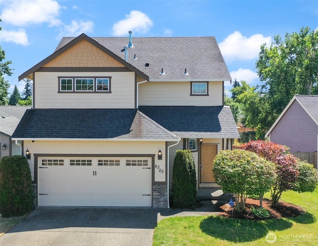 8305 54th Ct SE, Lacey, WA 98513 - view of front of home featuring a shingled roof, concrete driveway, and stone siding