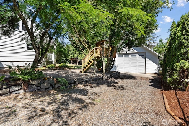 34226 42nd Ave S, Auburn, WA 98001 - view of yard featuring driveway and a garage