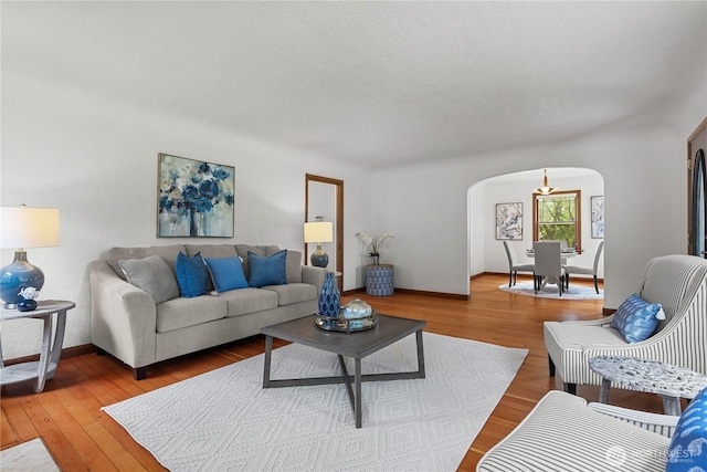 34226 42nd Ave S, Auburn, WA 98001 - living area with arched walkways and wood finished floors