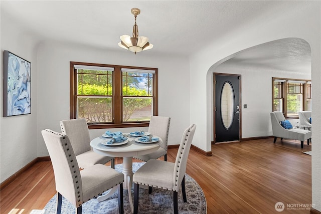 34226 42nd Ave S, Auburn, WA 98001 - dining room featuring arched walkways and light wood-type flooring