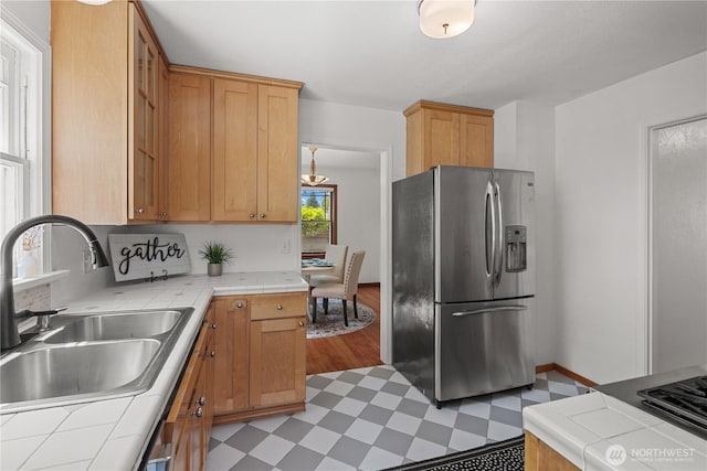 34226 42nd Ave S, Auburn, WA 98001 - kitchen featuring stainless steel fridge, light floors, and tile counters