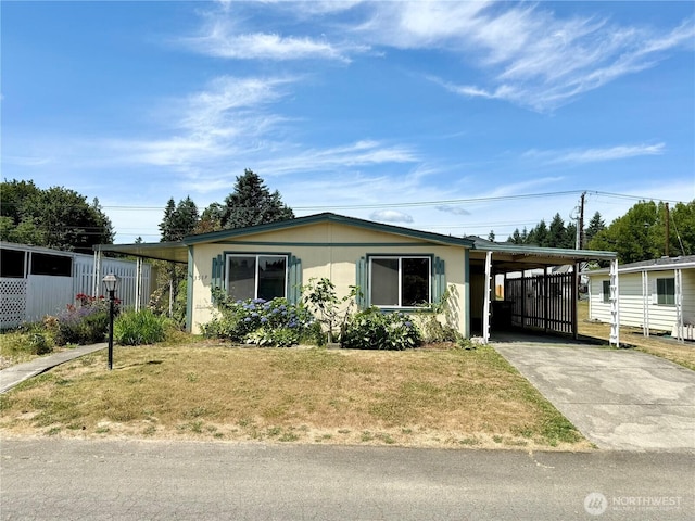 1519 Alonda Ln NE, Olympia, WA 98516 - view of front of property featuring driveway, a front yard, and an attached carport