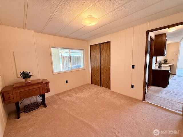 1519 Alonda Ln NE, Olympia, WA 98516 - carpeted bedroom featuring a closet and a textured ceiling