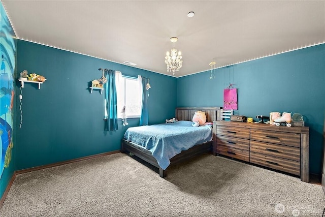 16908 61st St NW, Vaughn, WA 98394 - bedroom featuring carpet flooring and a chandelier