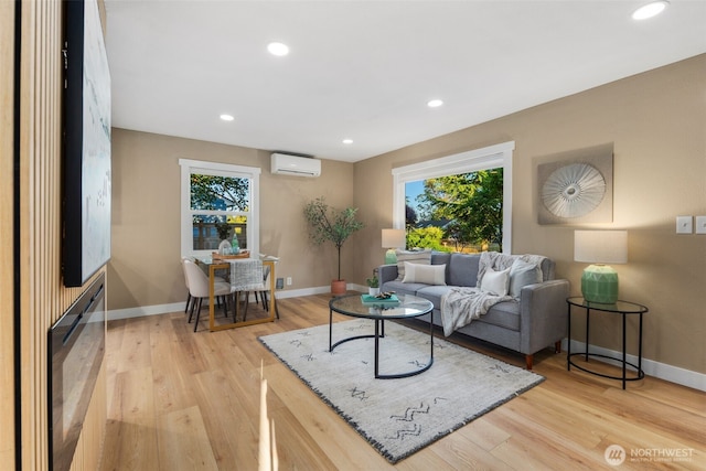 3130 SW 97th St, Seattle, WA 98126 - living room featuring a wall mounted air conditioner, healthy amount of natural light, light wood-style floors, and recessed lighting