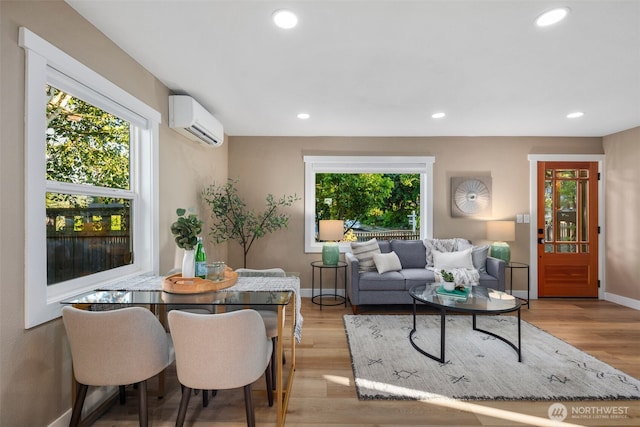 3130 SW 97th St, Seattle, WA 98126 - living area with a wall mounted AC, plenty of natural light, recessed lighting, and light wood-style floors