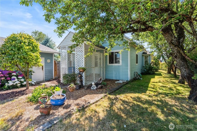 701 13th St SE, Puyallup, WA 98372 - view of front of home with a front yard and an outbuilding