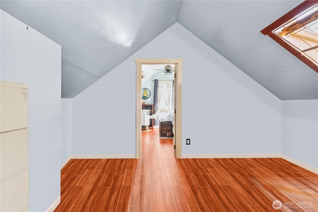 701 13th St SE, Puyallup, WA 98372 - bonus room with wood finished floors, lofted ceiling, and ceiling fan