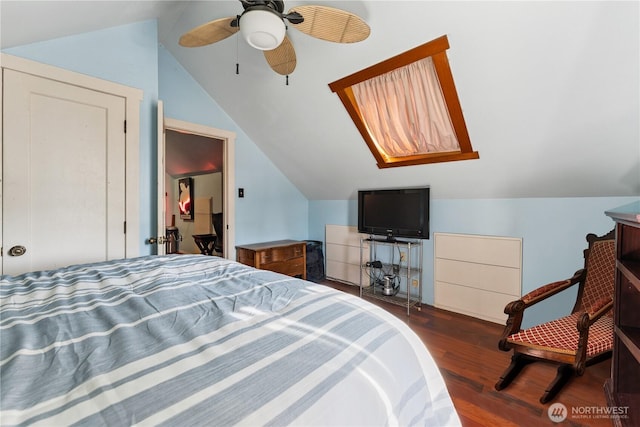 701 13th St SE, Puyallup, WA 98372 - bedroom featuring vaulted ceiling, dark wood-style floors, and ceiling fan
