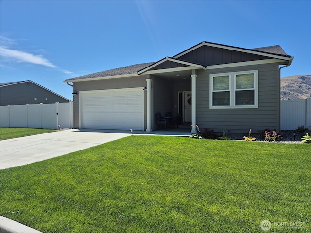 420 Hammond Ln, Rock Island, WA 98850 - single story home featuring an attached garage, concrete driveway, and board and batten siding