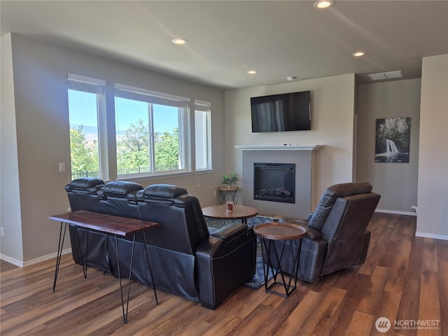 420 Hammond Ln, Rock Island, WA 98850 - living area featuring dark wood-style floors, a tile fireplace, and recessed lighting